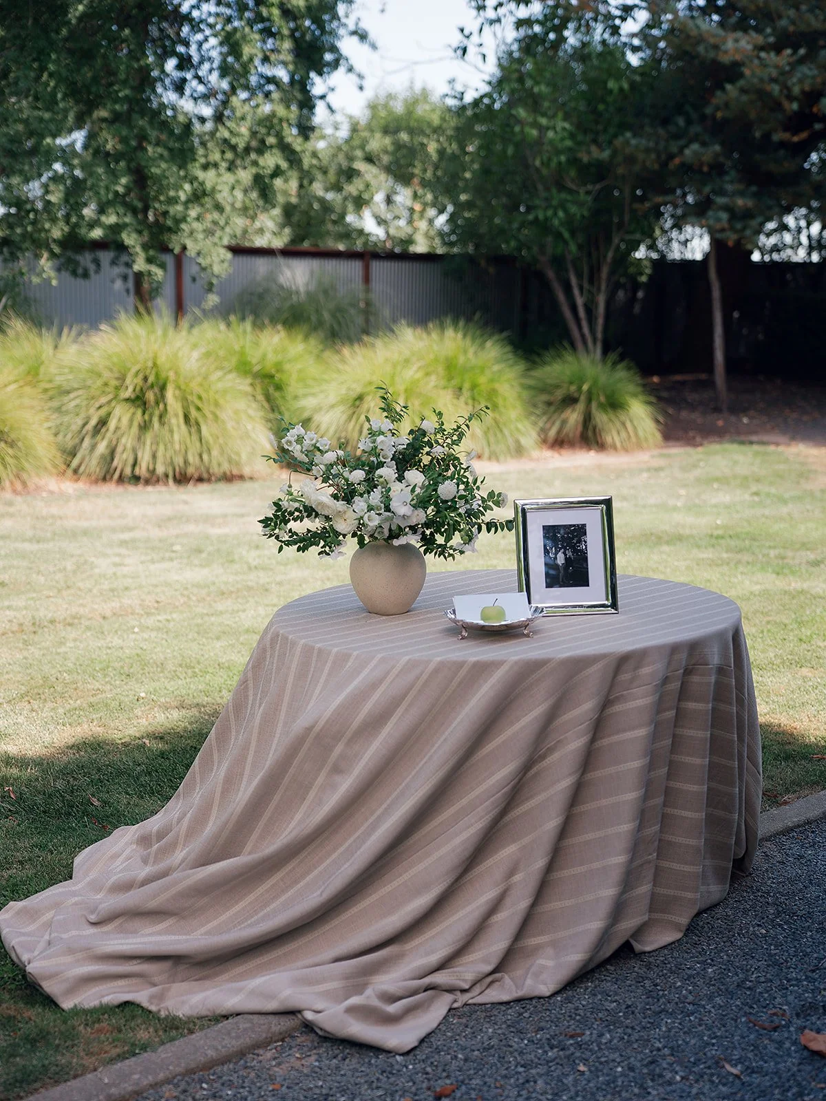 Detail shot of wedding floral accents and décor at Oak Grove Estate in Sonoma County, designed by L’Relyea Events.