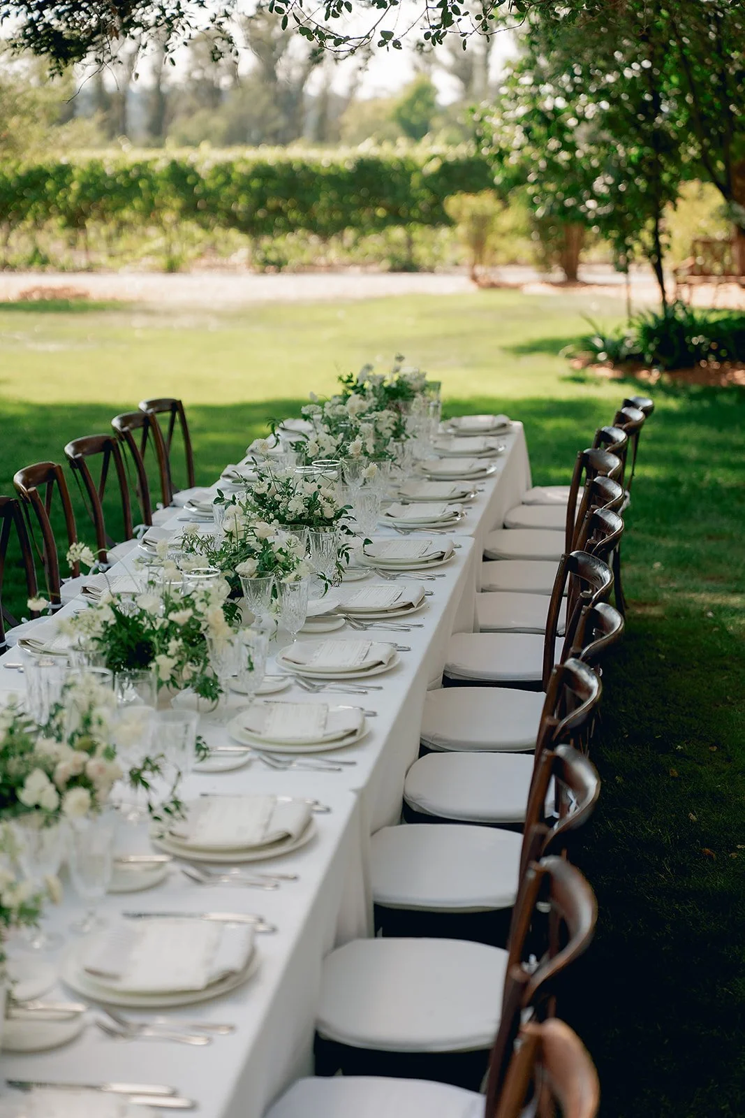 Elegant reception styling with vineyard sunset views at Oak Grove Estate wedding in Sonoma County, planned by L’Relyea Events