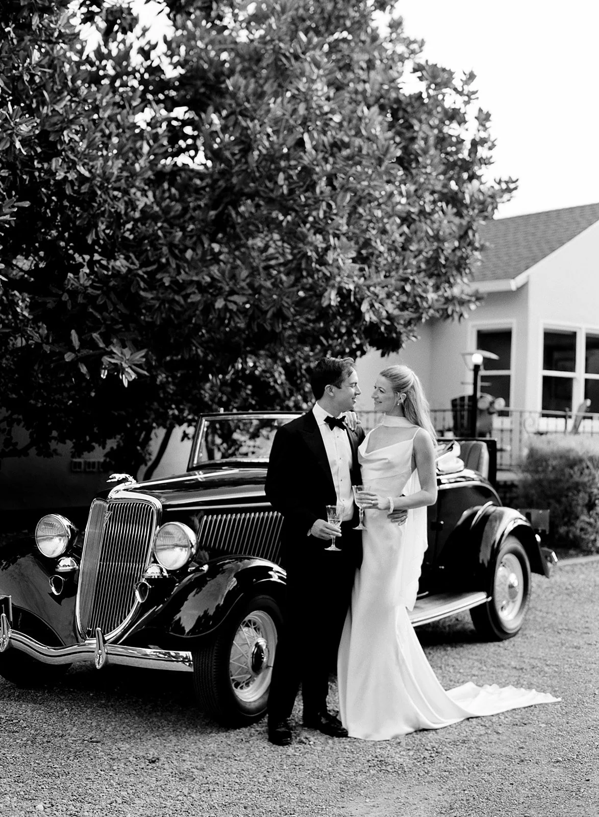 Bride and Groom with Vintage Car at a Sonoma County Oak Grove Estate wedding by L’Relyea Events
