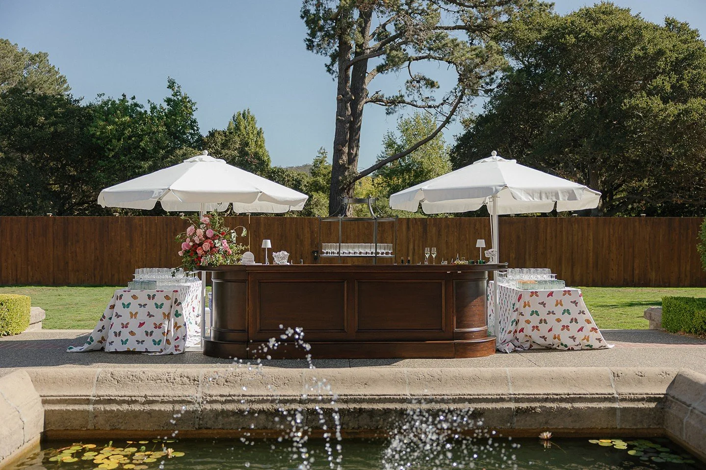 Cocktail hour should feel like an experience &mdash; immersive, intentional, and unforgettable. At this vibrant wedding at, guests stepped into a colorful, design-forward celebration filled with bold pink and red florals, elevated lounge moments, cha