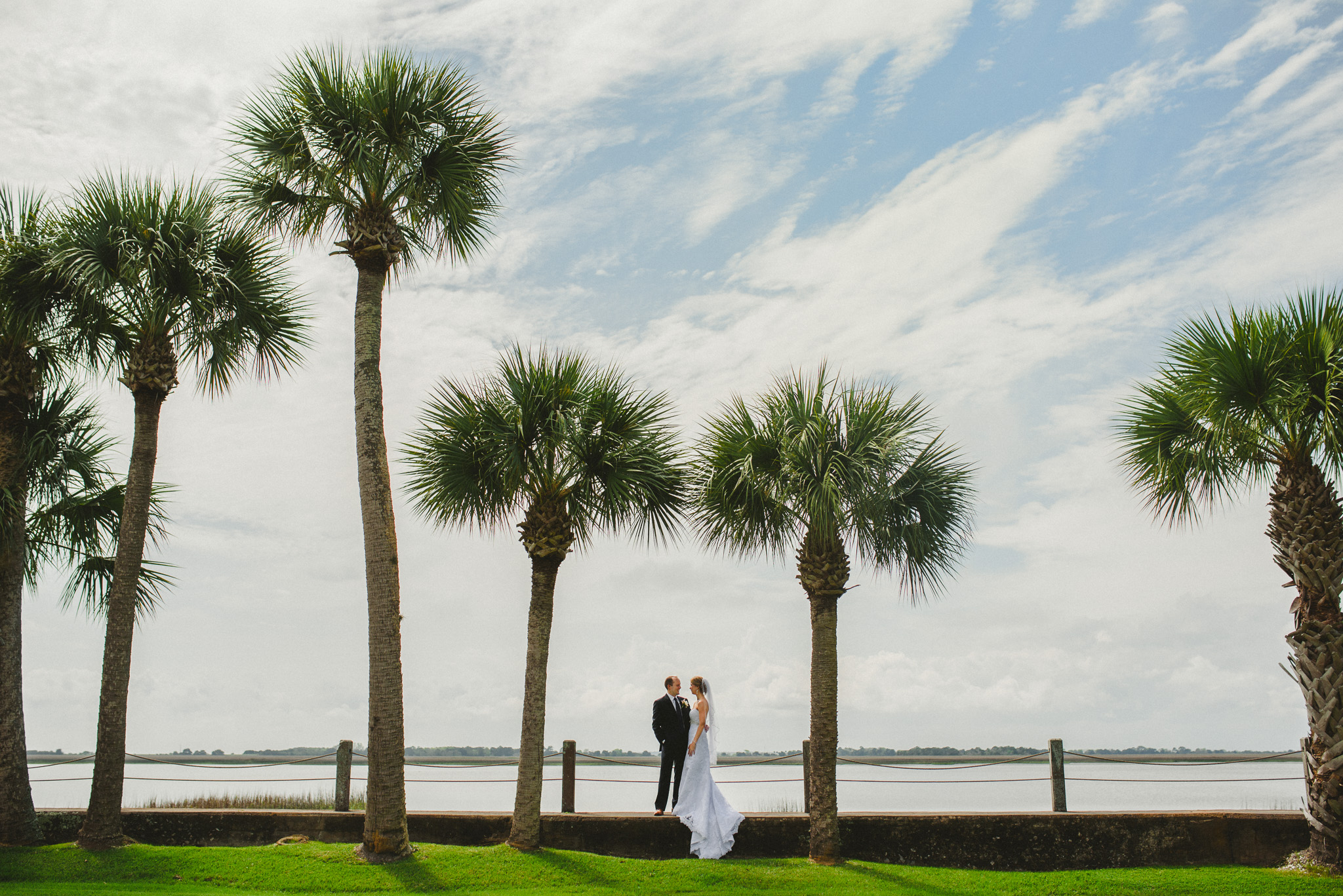 Jekyll Island Wedding - Bride and Groom with Palm trees