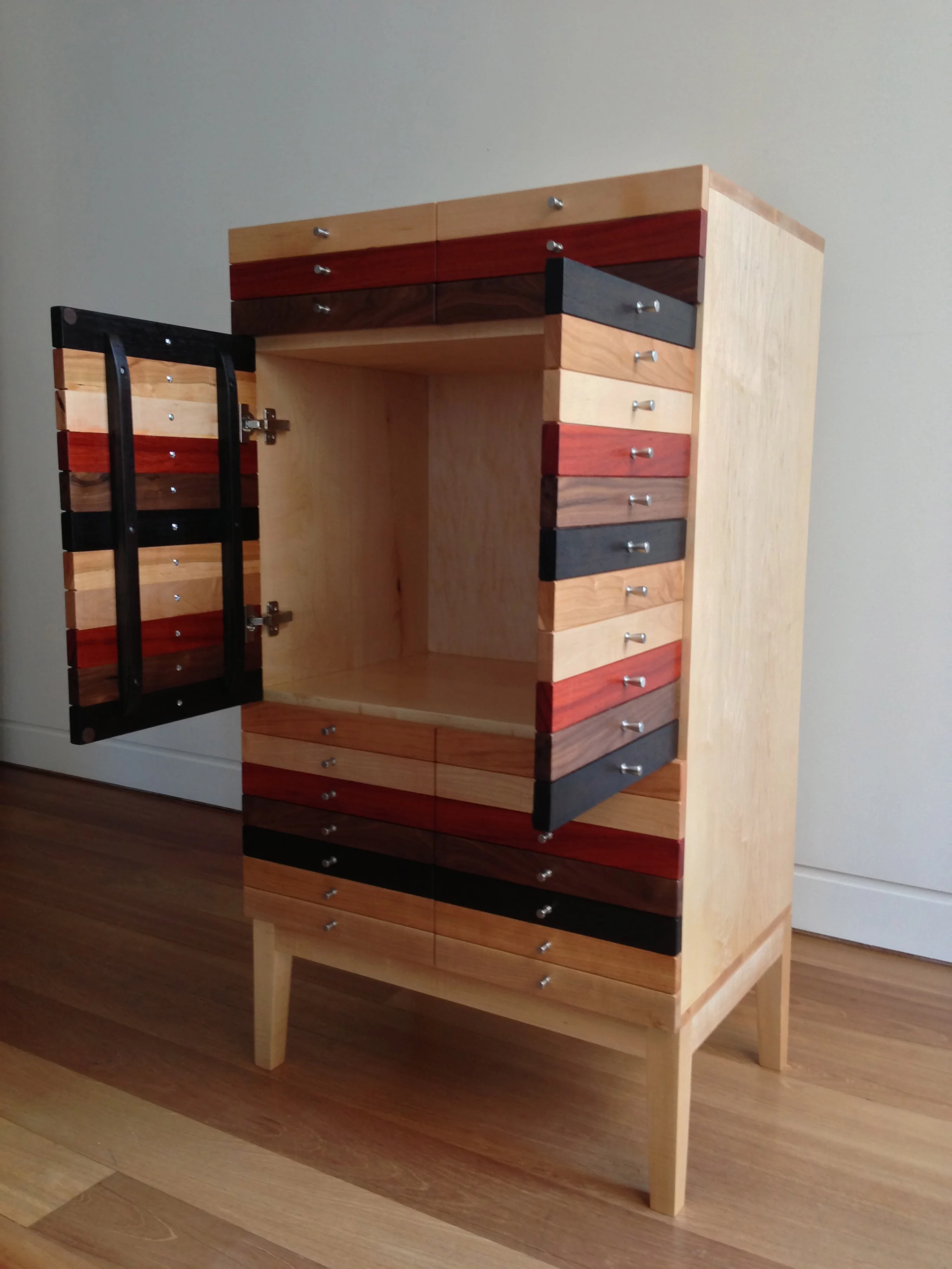 There is a large cabinet section in the middle.