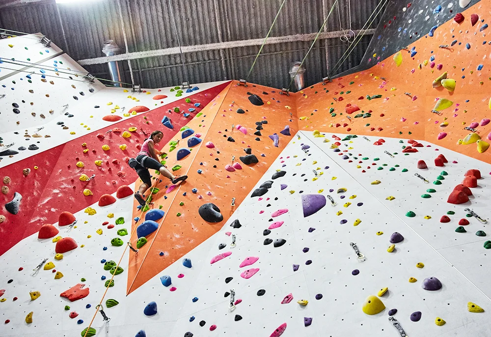 Sol climbing in the high bay. Photo by Joshua Pestka .