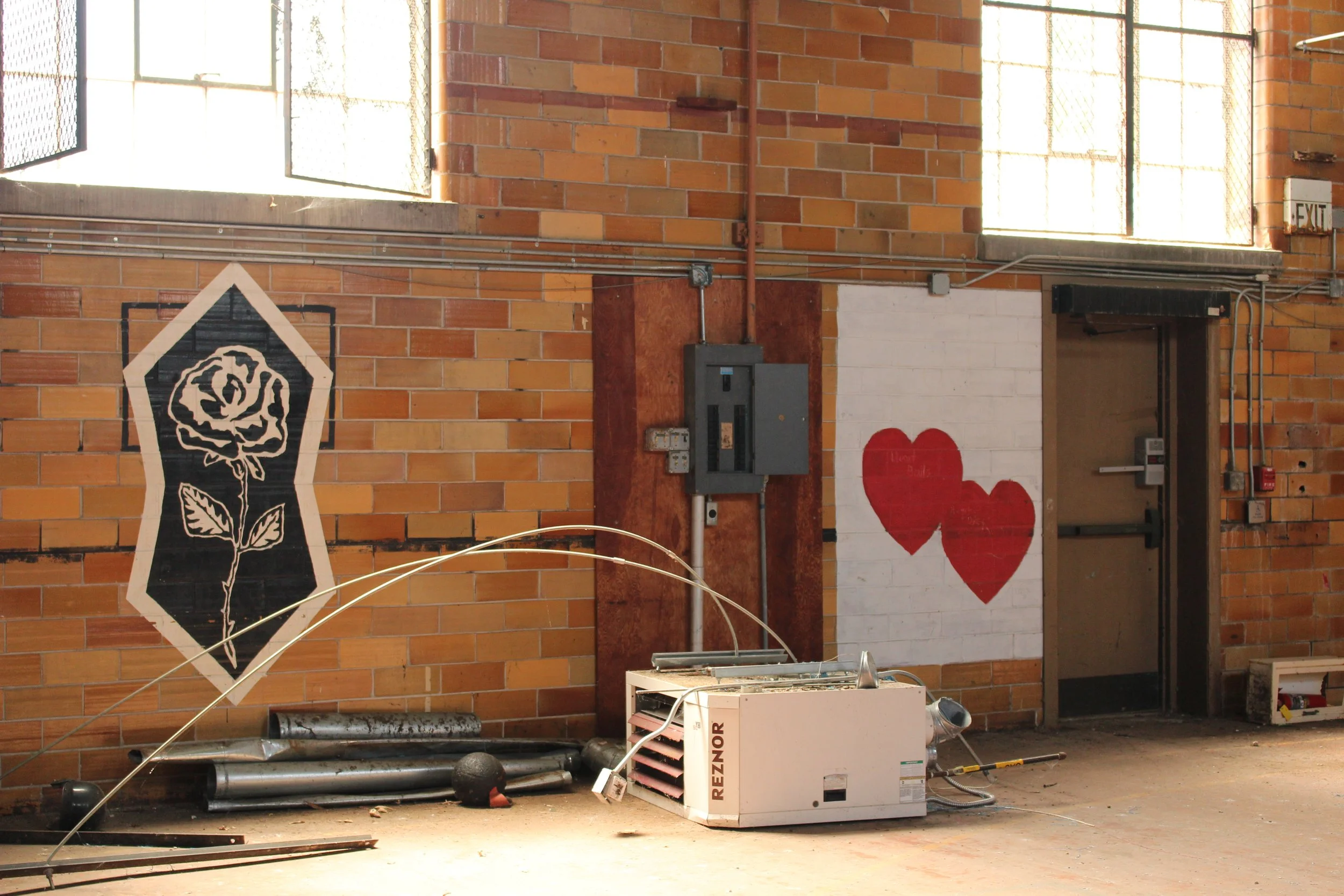  Murals of the Lockheart and Rosette social clubs. Rosette has since disbanded, but the Lockhearts remain active on campus.  