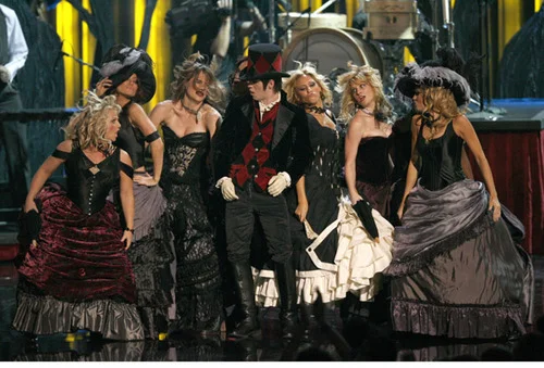 Dancing with Panic! At The Disco in 2006. Choreography by Danielle Flora (I'm all the way right in the big purple skirt and big hat.) 