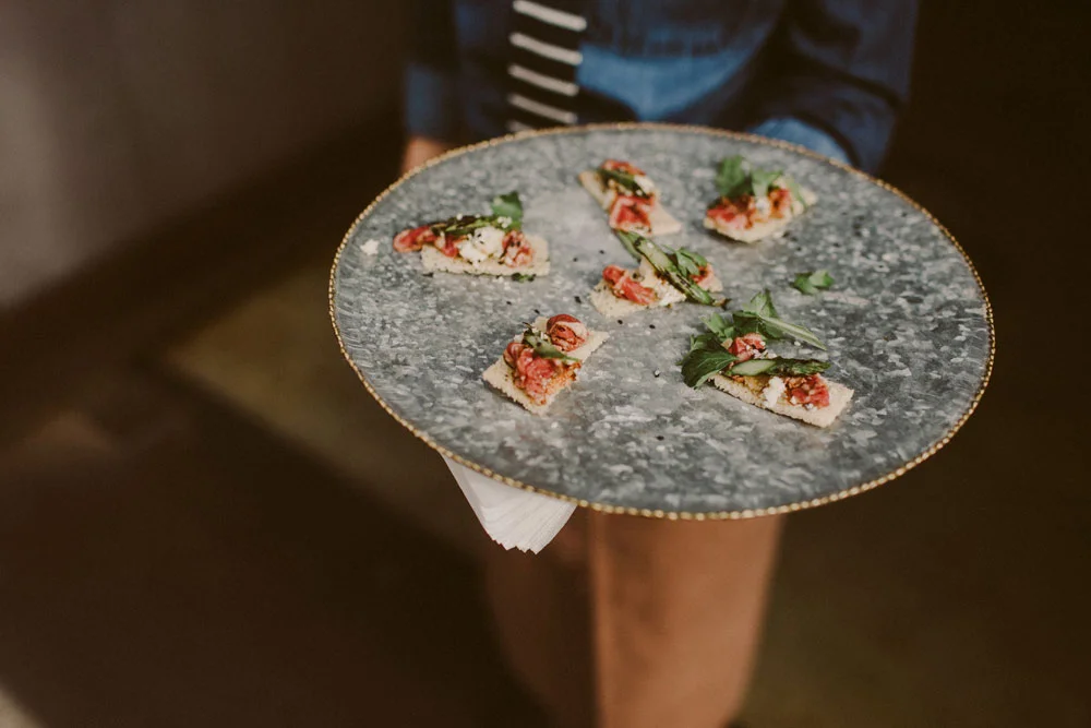FLAT IRON CARPACCIO : thinly sliced with caramelized cambazola, sesame glazed asparagus & fresh herb salad on rye crostini