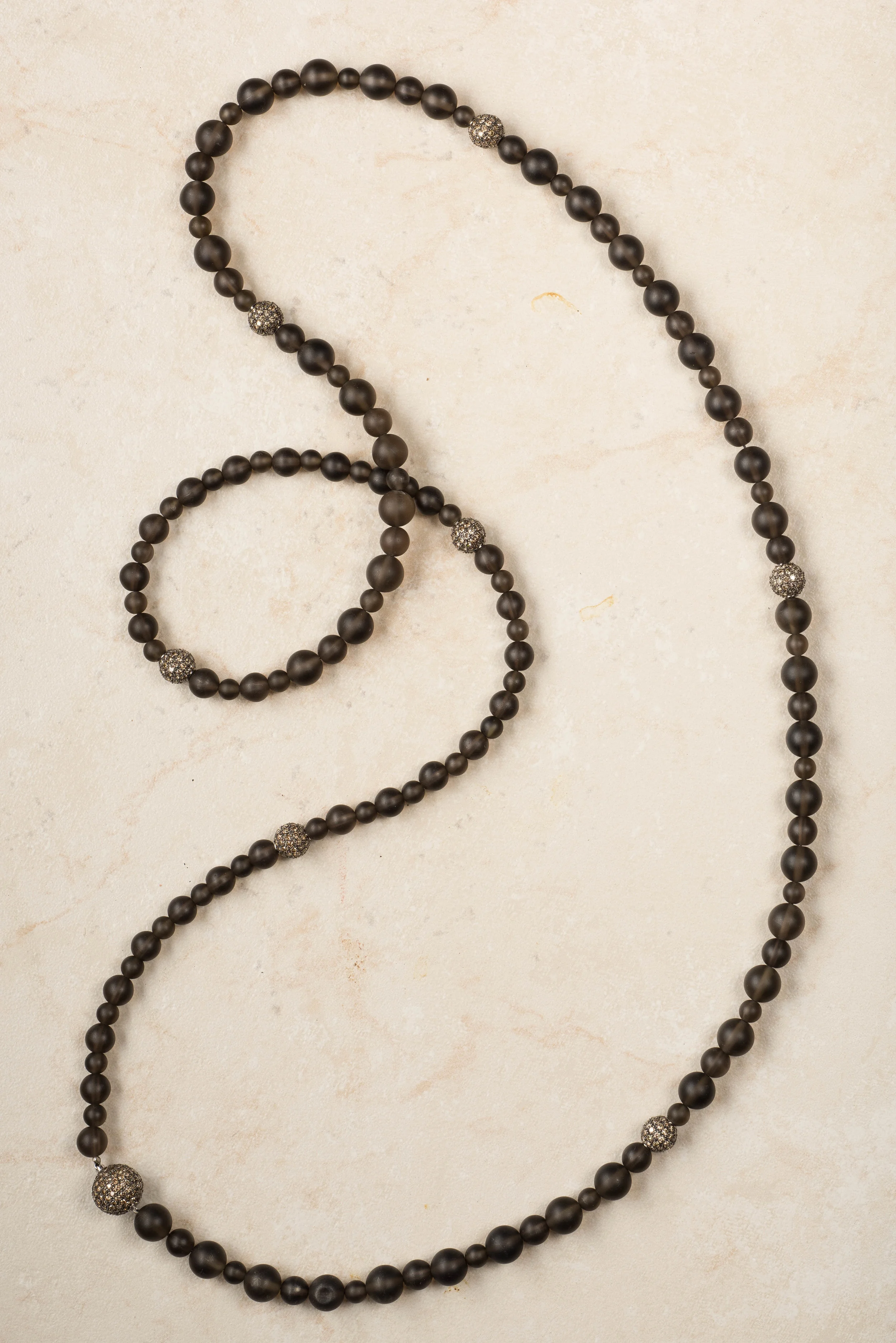 smoky quartz  matte bead and 8 brown diamond beads/n18  