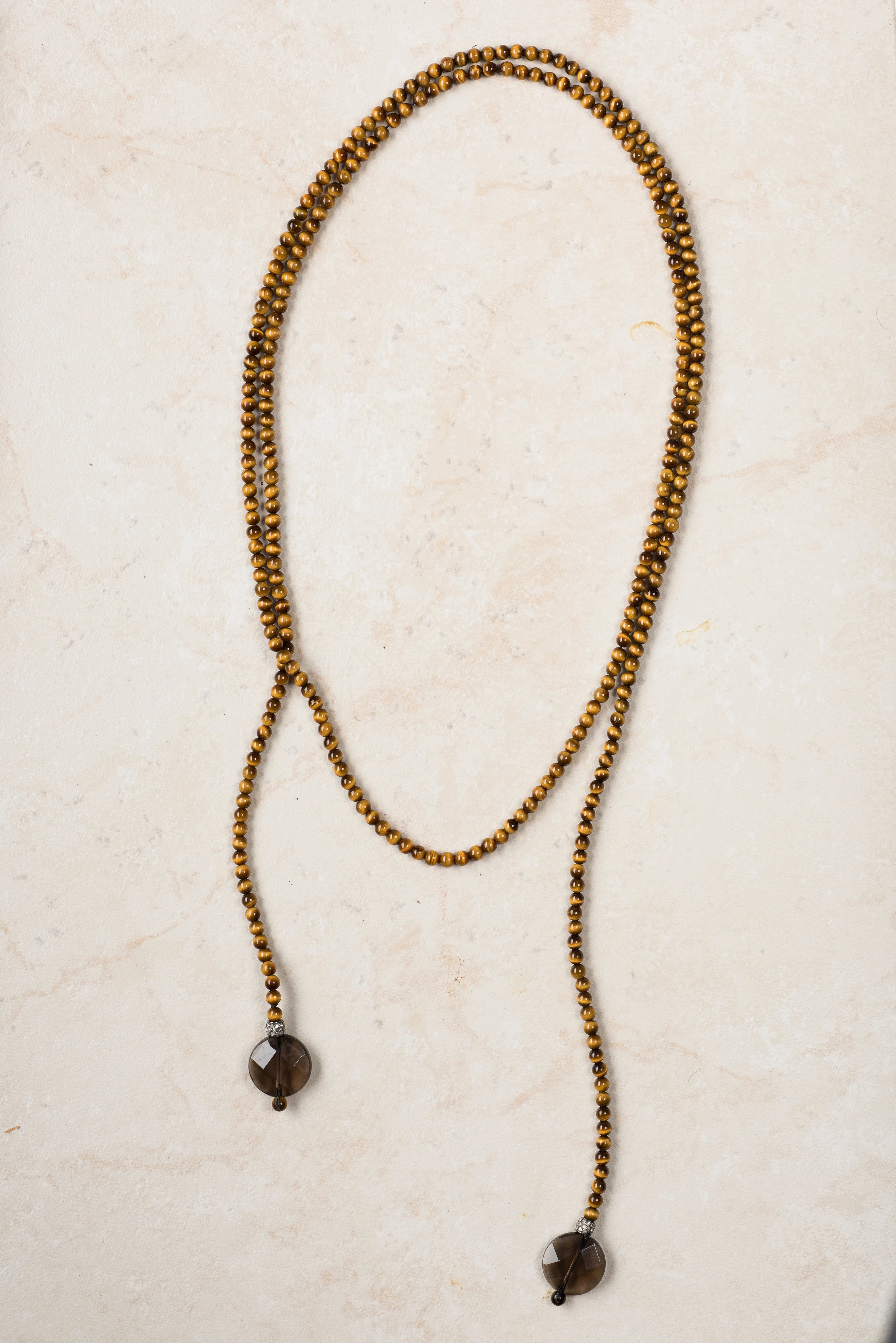 tigers eye, smokey quartz, diamond trim lariat/n103