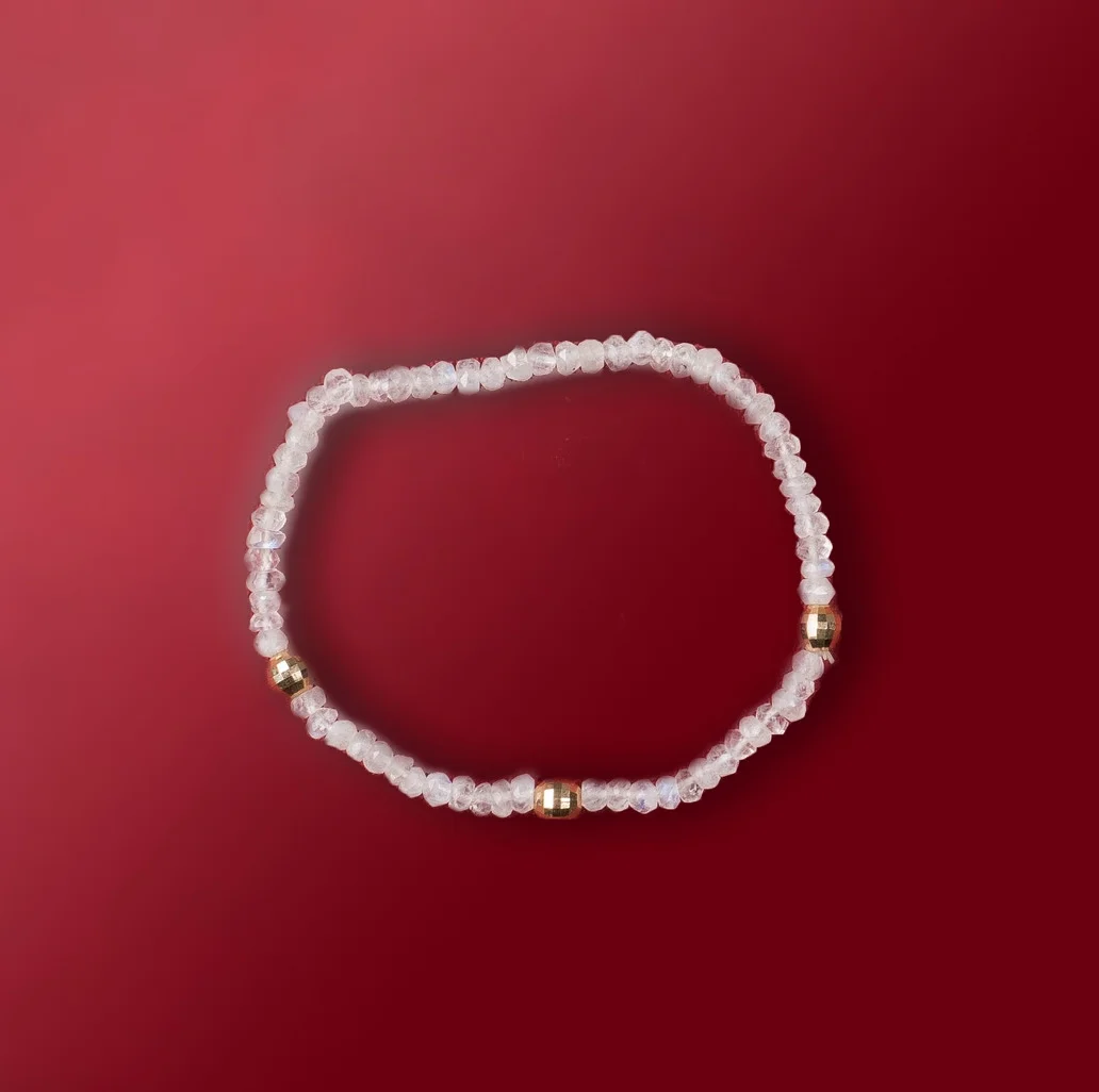 crystal and 14 carat bead/stretch/b123