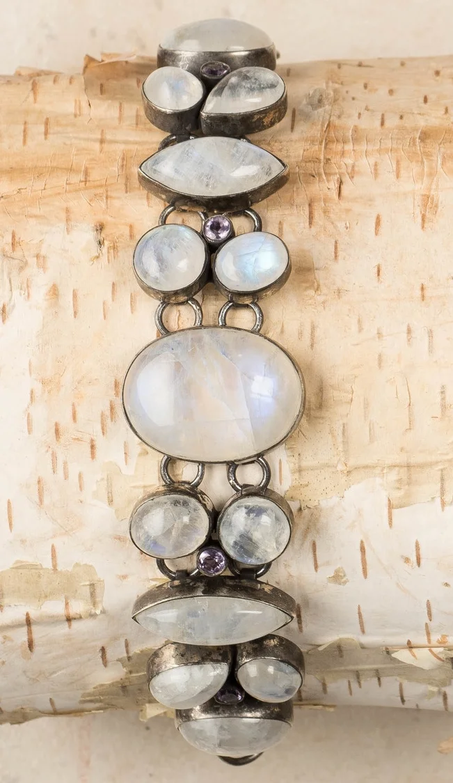 crystal in dark silver encasing/b41