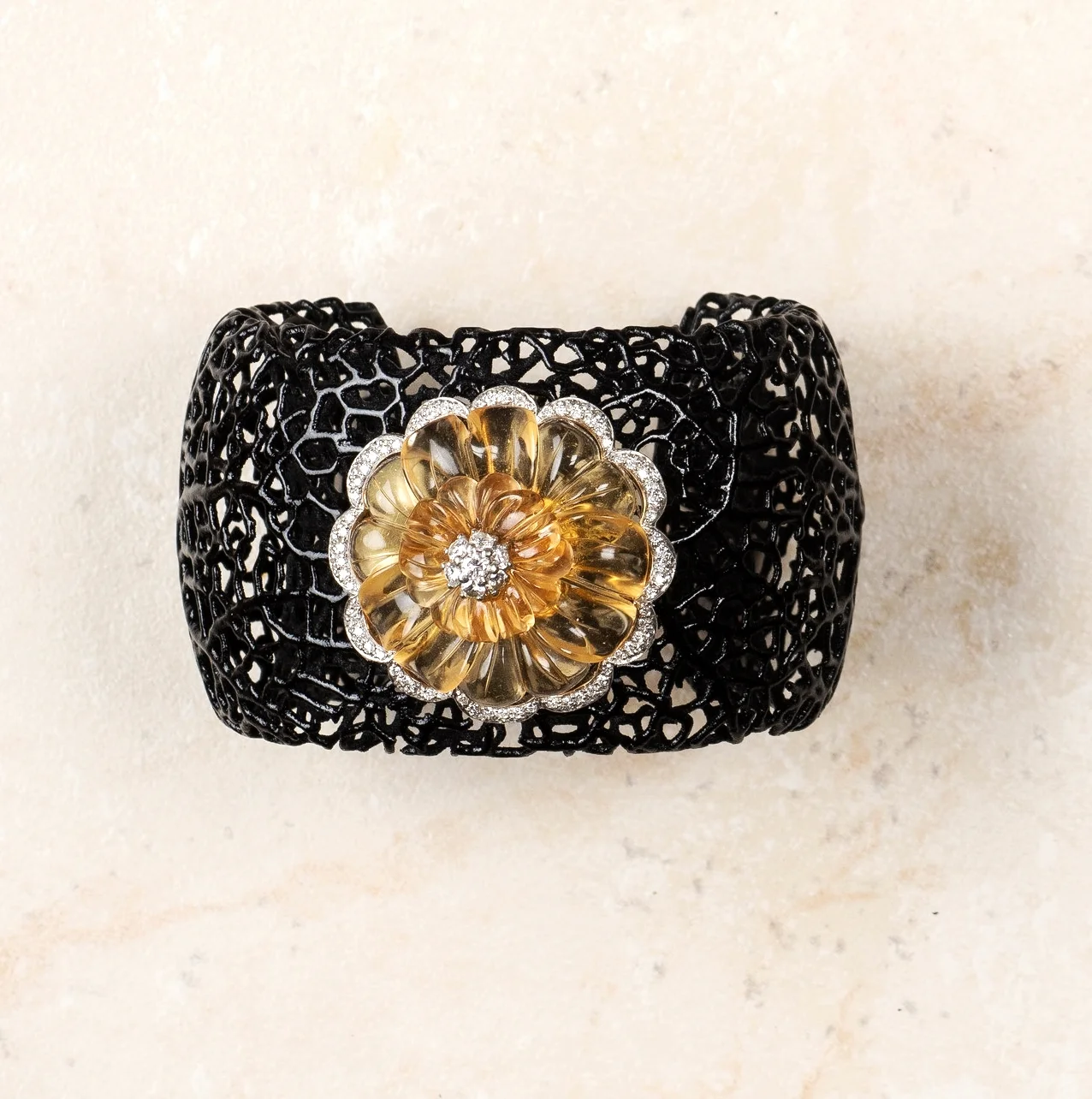 plast weave and yellow saphire flower/18ct gold trim , diamond edge/cuff/b139