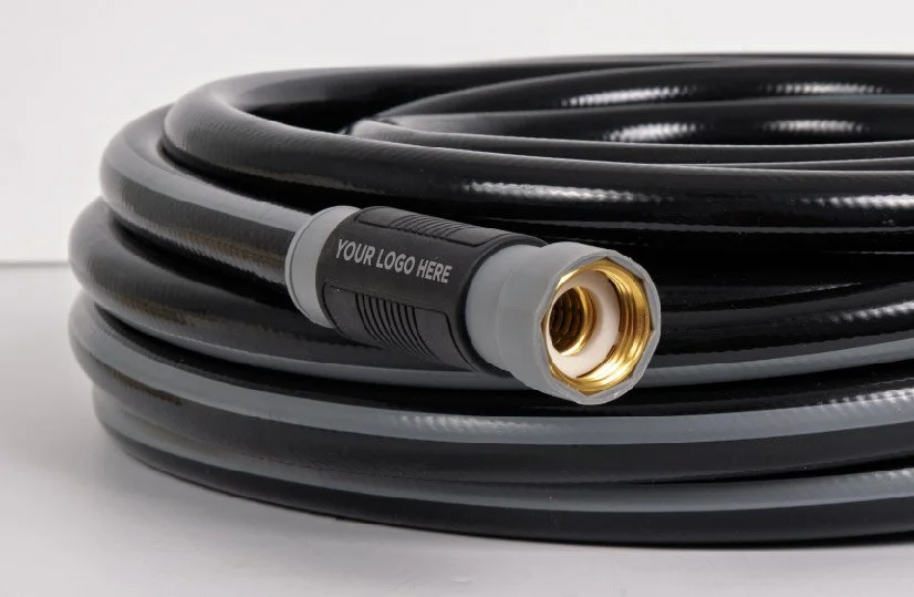 Black and gray heavy duty garden hose with a private label logo area on the connector