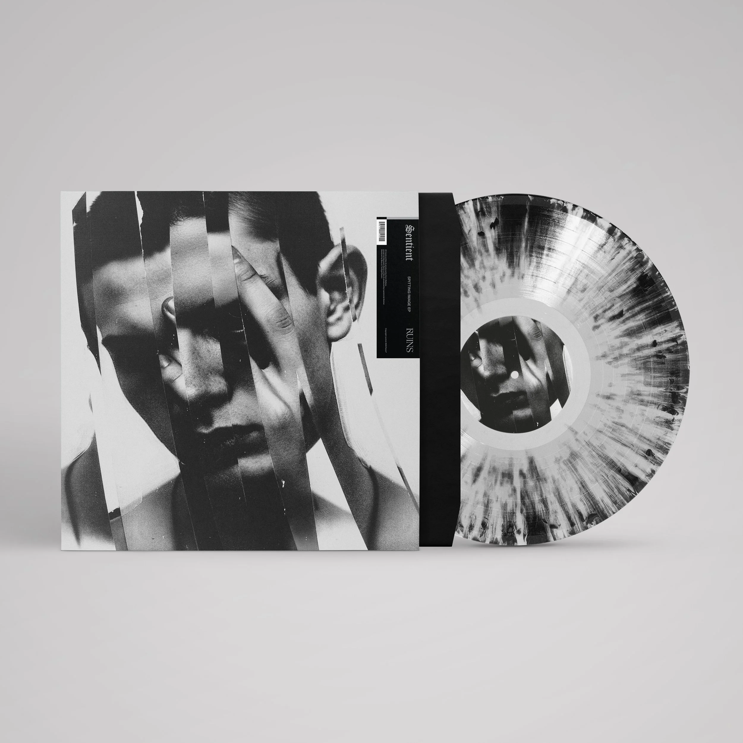 Sentient_Spitting Image EP_Vinyl Mockup.jpg