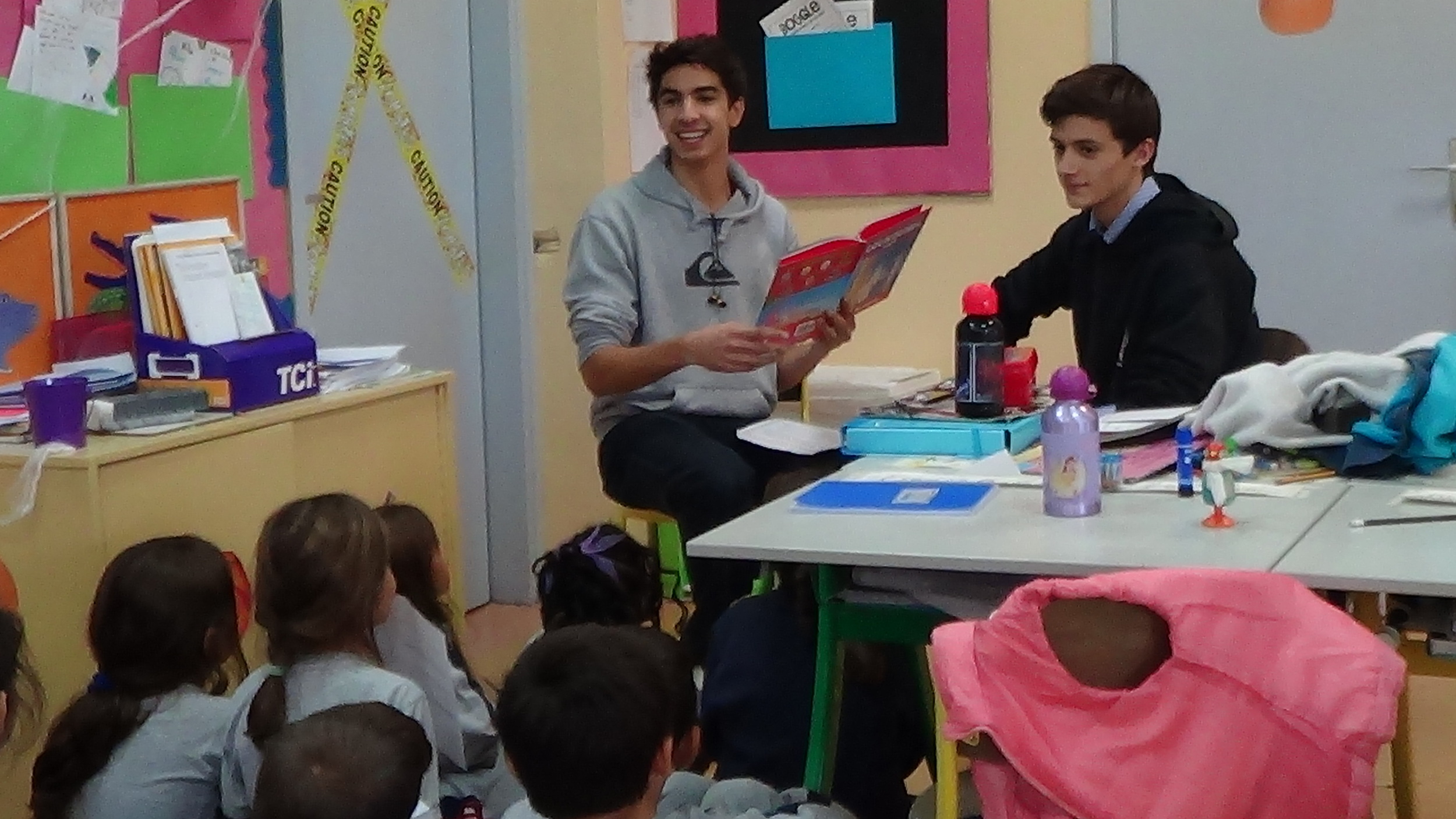 ARIS & ACHILLEAS READ LOUKOUMI'S GOOD DEEDS TO ACS ATHENS 3RD GRADERS.JPG