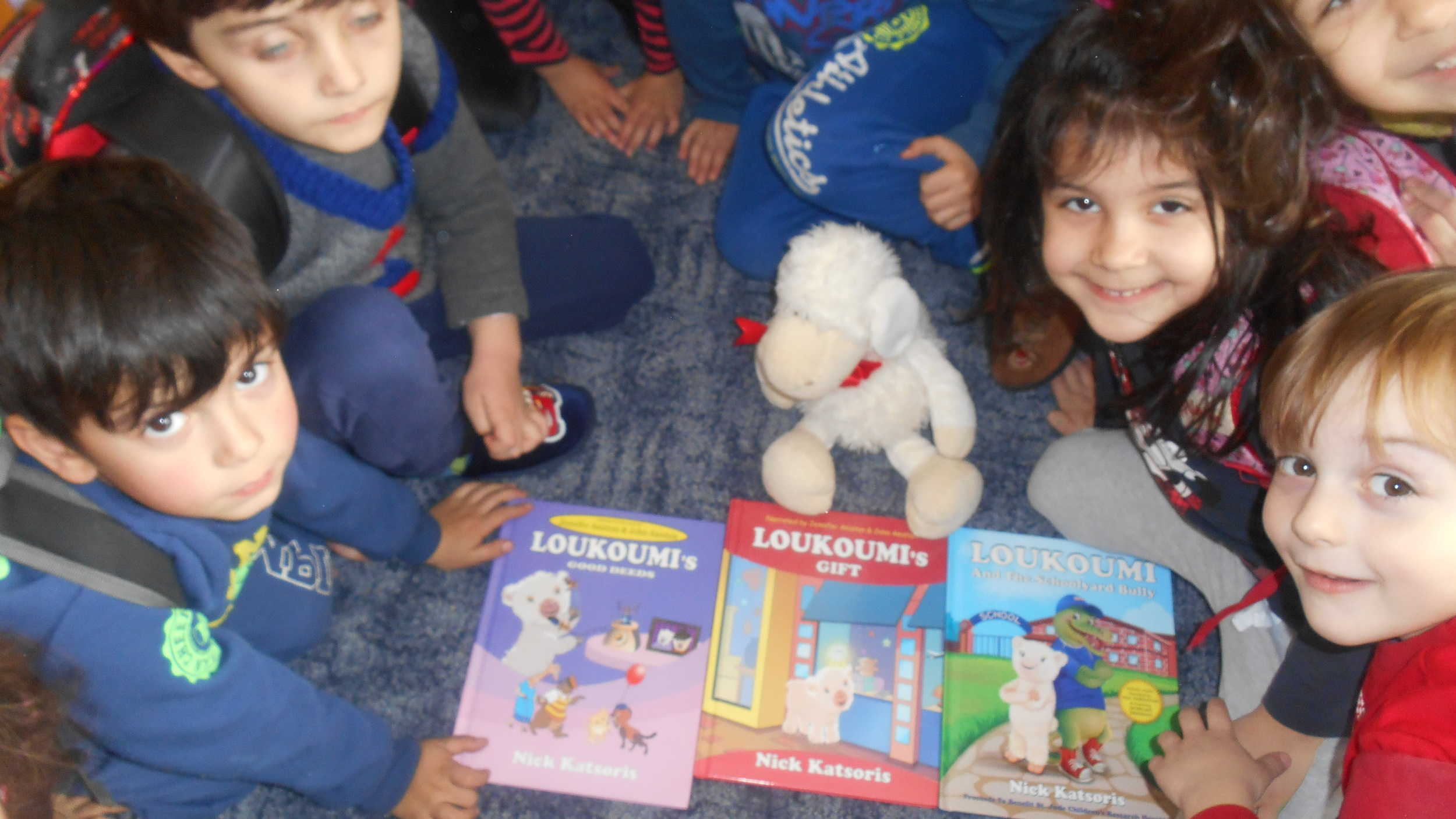 Children at the nursery school of Keratsini read Loukoumi's Good Deeds books!.JPG