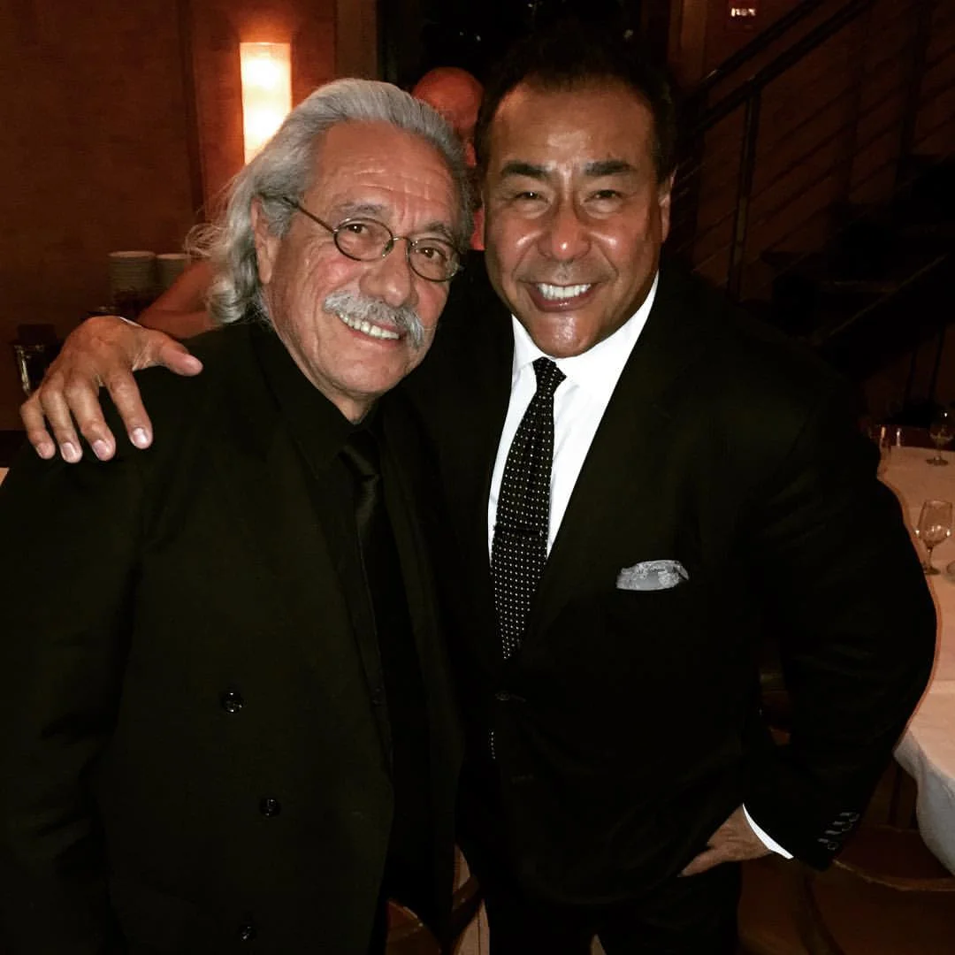 About — John Quiñones