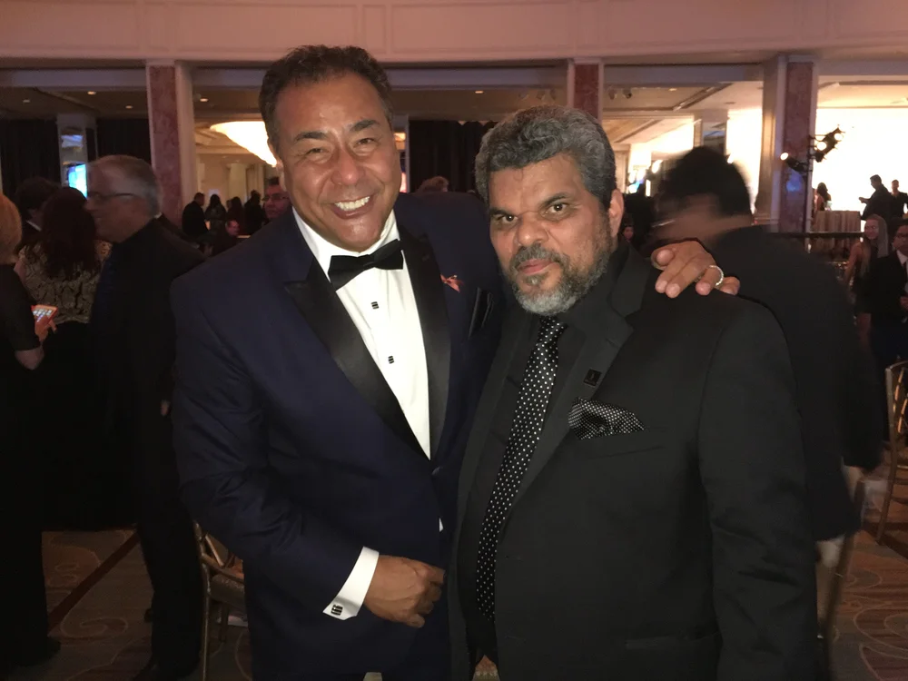 About — John Quiñones