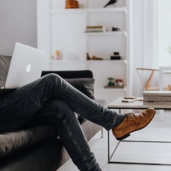 kaboompics_Man Working in Scandi Apartment.jpg
