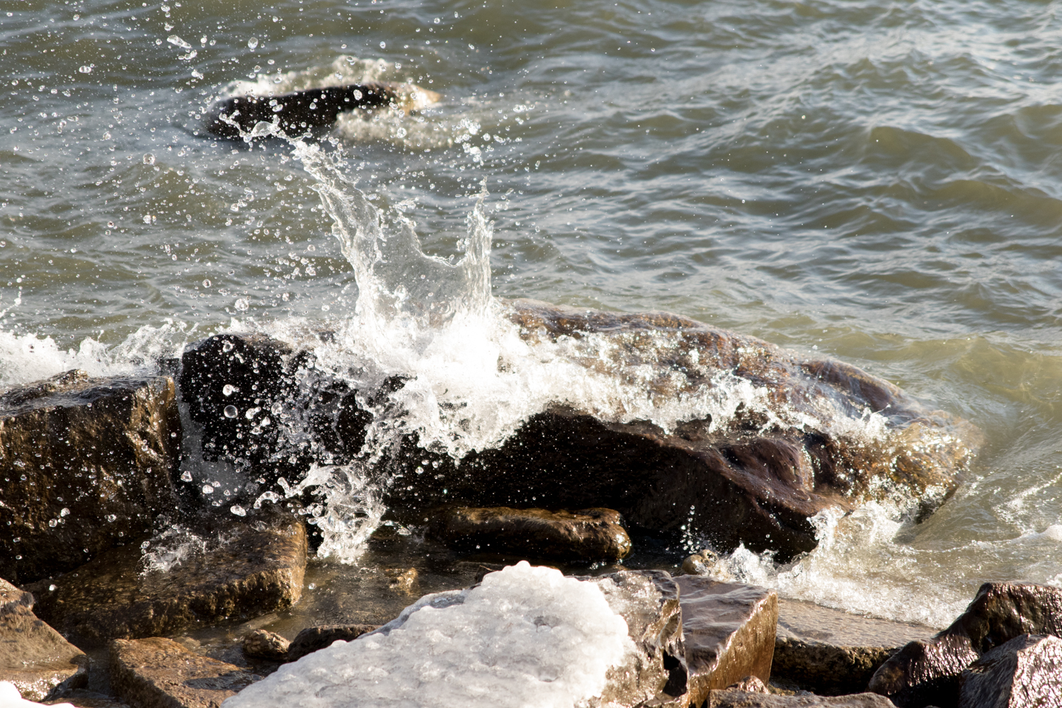 Water splashing up on rocks in Long Branch Park, Toronto. January 25th. 