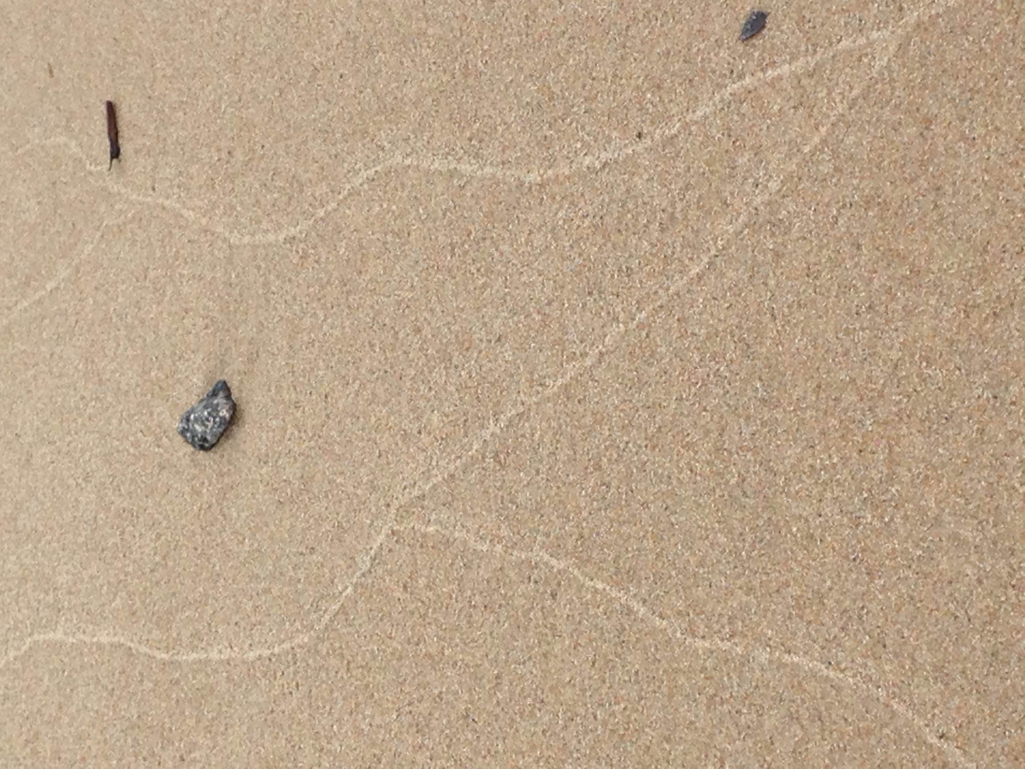 To draw a line in the sand, beach-style