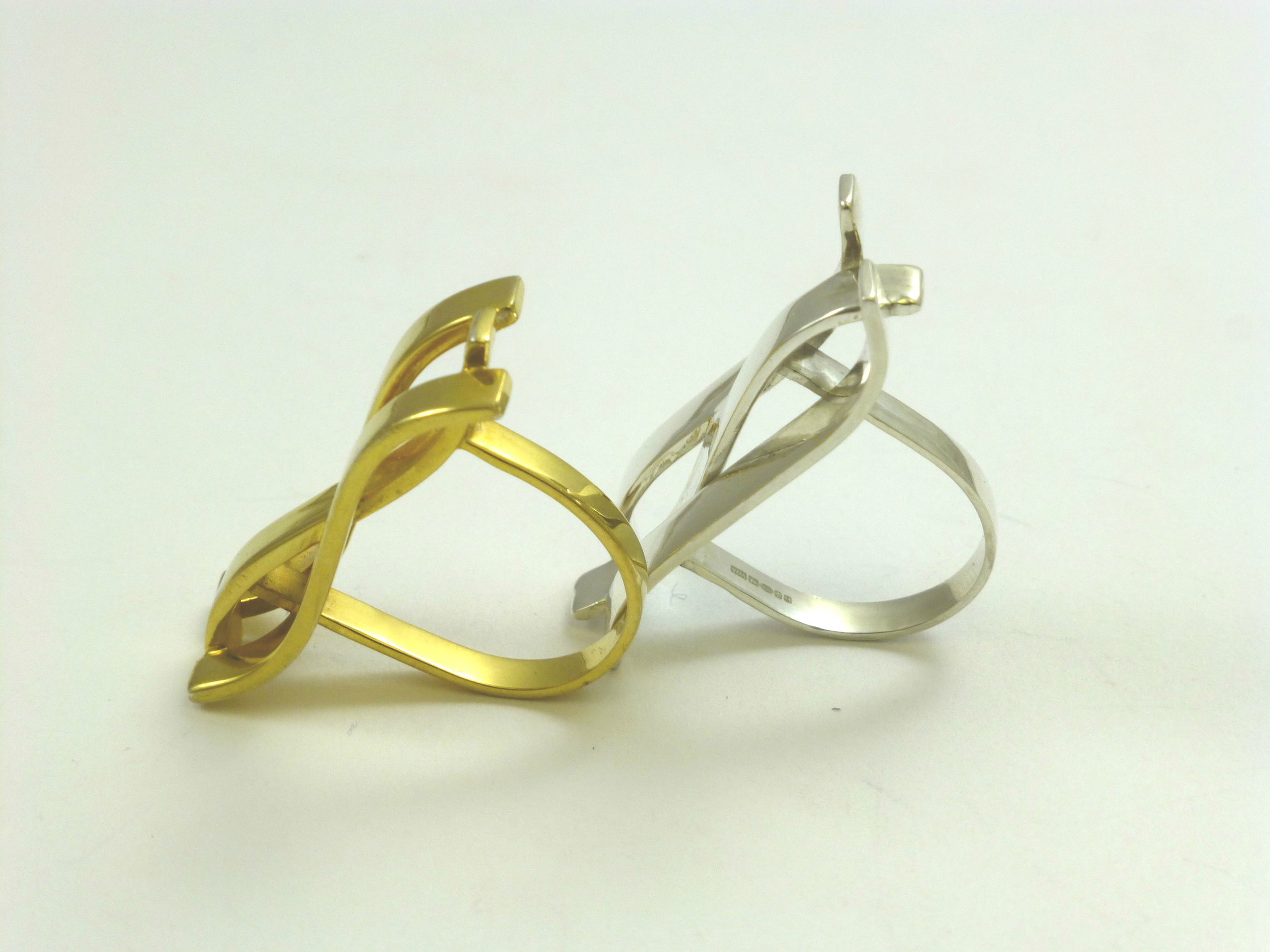 Gold and sterling silver trio wave rings