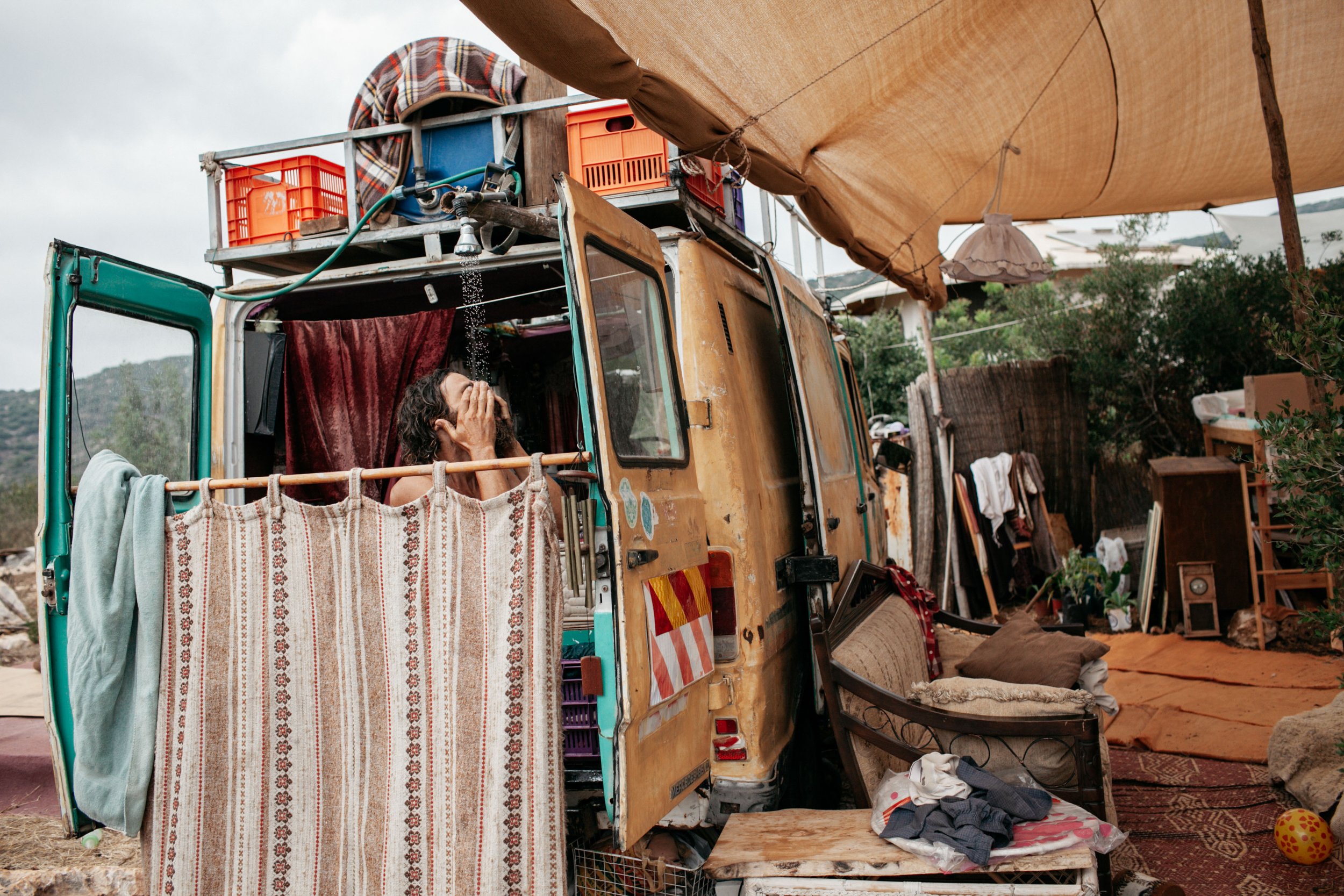 Even though the family found a permanent residence for their van.The Van still used as a home for them,and as one they have their shower over there.