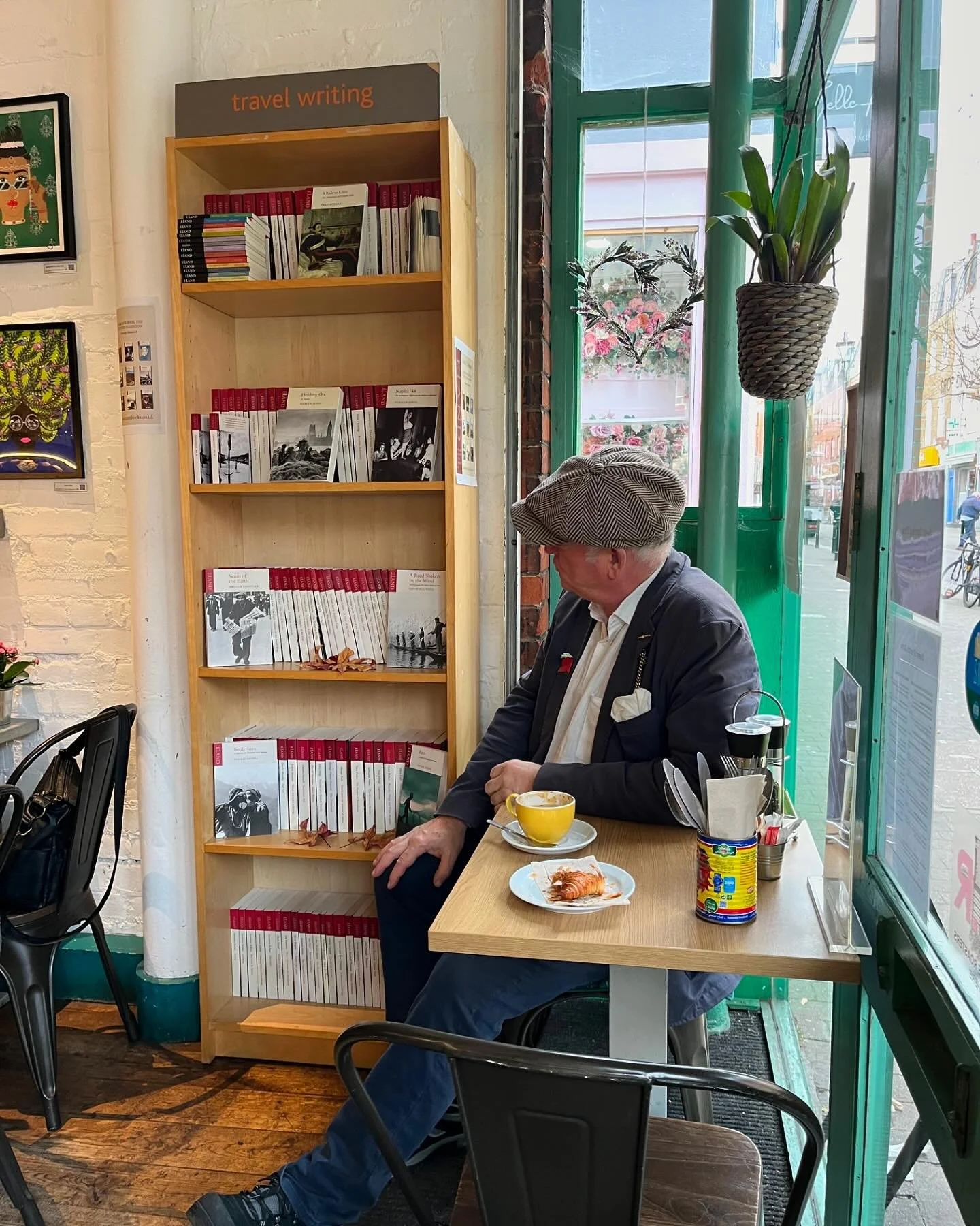 A rather shady looking character by the new bookcase at the glorious café Sweet @sweet_boulangerie on Exmouth Market. You can now get your favourite Eland titles while enjoying a cappuccino and more. Book club coming soon.  #newstockist #popup