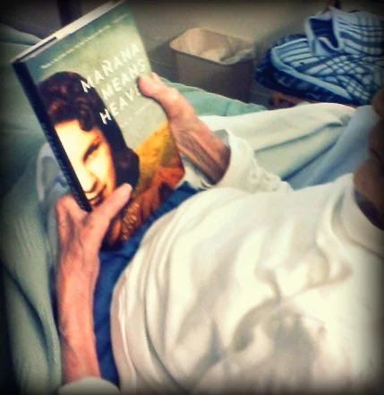 Bea Franco holding a copy of Mañana Means Heaven. Photo Courtesy of Bea Kozera Estate.