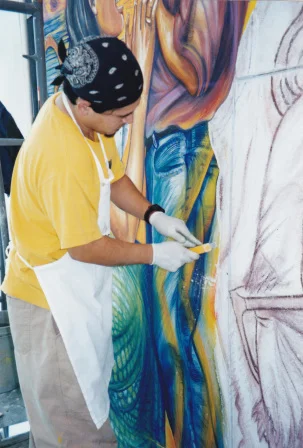 -Tim working on fresco mural “Santuario” with artist Juana Alicia, San Francisco International Airport, 1999.
