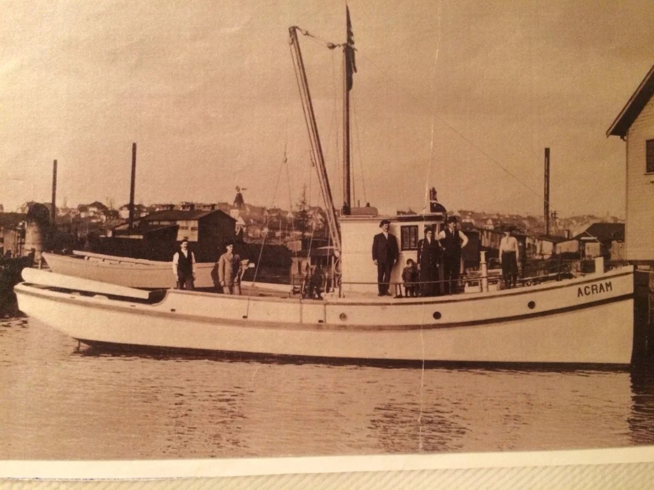 My great-grandfather's boat. My grandpa is the little one standing in front of the wheel house. My great-grandparents are standing on either side of him. This is still in Ballard. Agram is a town in Croatia; the boat was originally called Crikvenica…