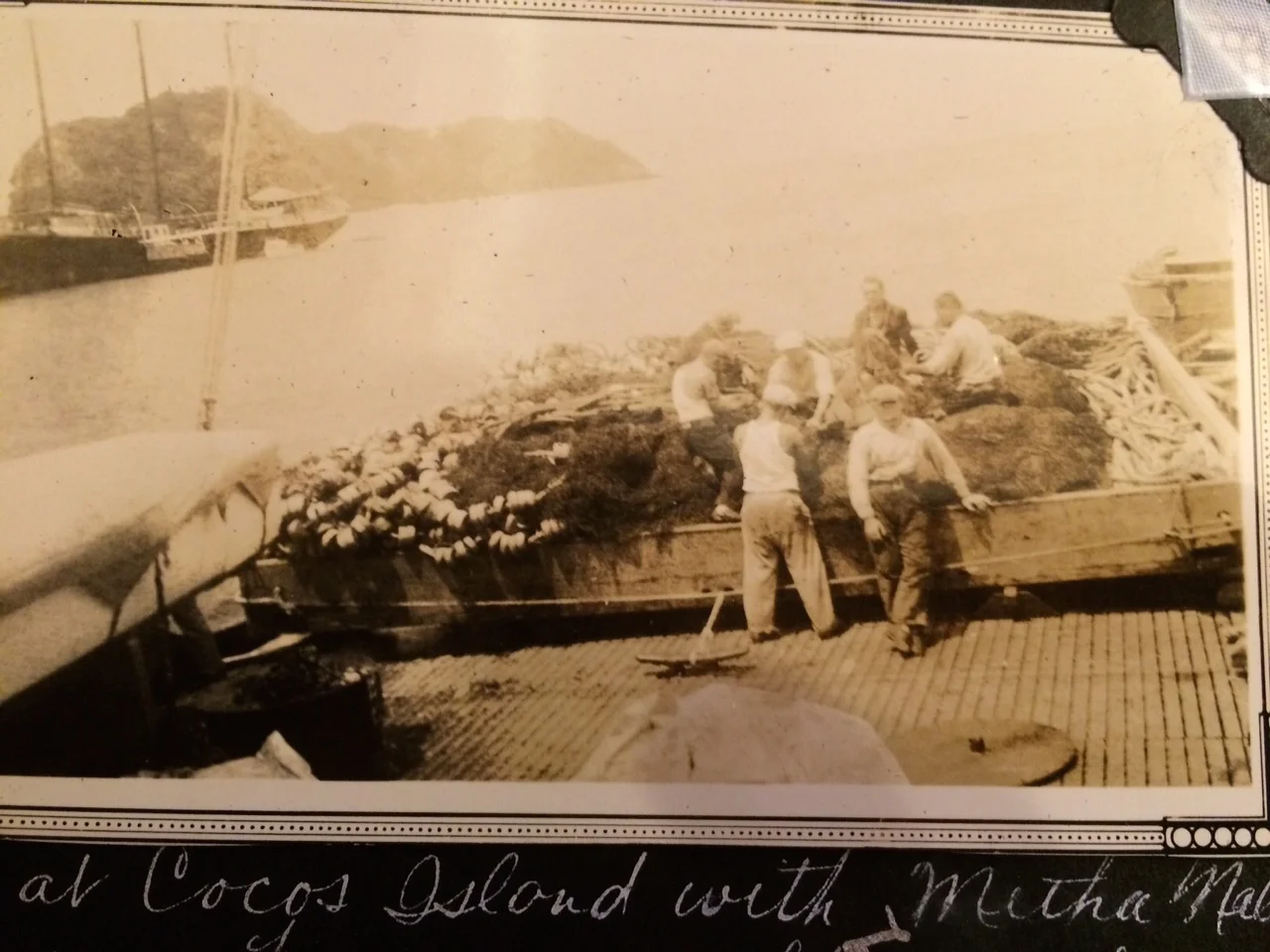 My grandfather and fellow fishermen off the coast of South America.