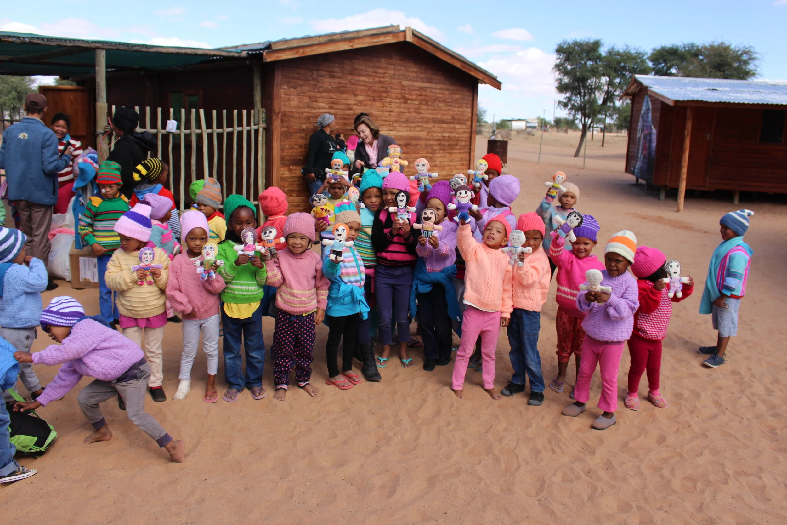 Happy Monday!! Don't have to say much......Just take a moment to see their smiles! We are very grateful to collaborate with Sesego Cares in South Africa. This was a part of our "BIG" campaign and we managed to send 50 dolls to children who live in the desert. Here is a quote from Sesego Cares: This unique community is the oldest in the world, also one of the most special communities and people in our beautiful country. I thought it fitting for these members to receive the dolls. They stay in the desert. Once again thanks for the amazing support. This was just brilliant and inspirational!