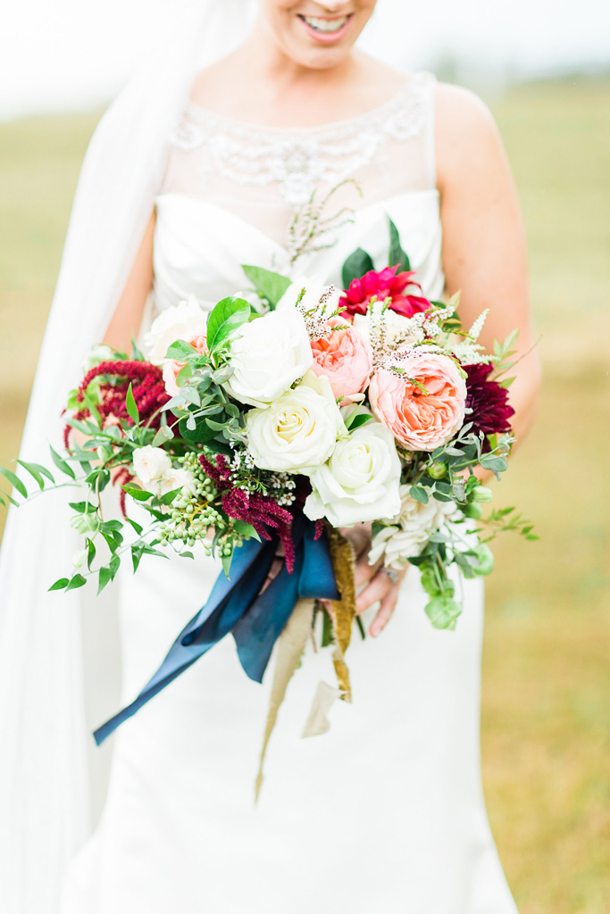 Bride-holding-Bowerbird-Florist-Bridal-Bouquet-Het-Landhuis.jpg