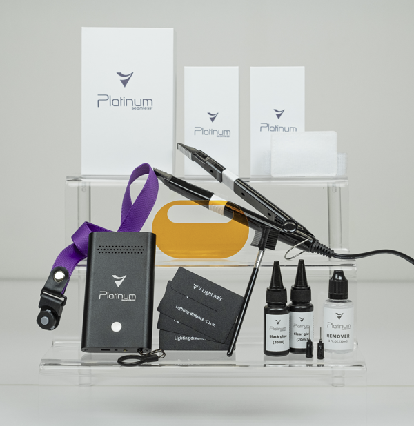 Full Platinum Seamless® V-Light Kit including curing machine, UV shield, adhesive, tools, cord, and accessories for professional extension application.