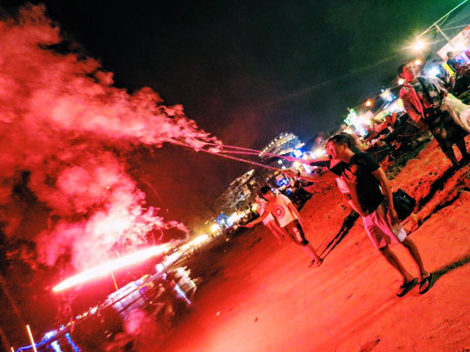 Tonight's entertainment: shooting Roman candles & releasing Chinese sky lanterns over the Gulf of Thailand. Clusters of glowing red lanterns are floating over the ocean & reflecting off the water. It's a pretty amazing sight.