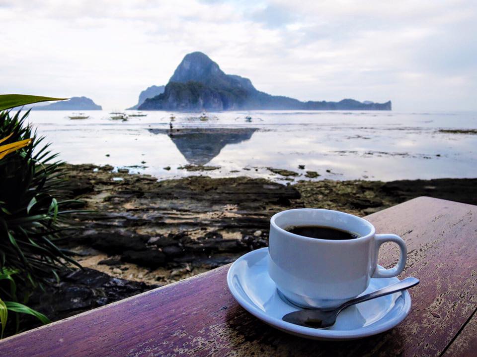 My last coffee photo was overlooking the mountain town of Banaue in central Luzon. Now I'm on Palawan overlooking Cadlao Island in the South China Sea.