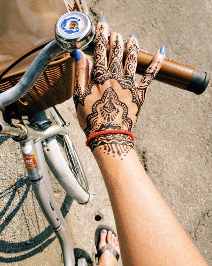 Challenge: biking with wet henna and an art print in my basket.
