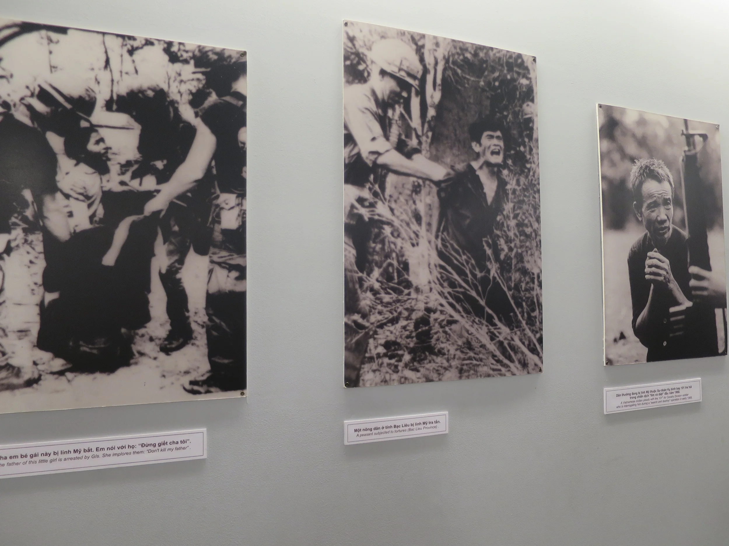 From left to right: “The father of this little girl is arrested by GIs. She implores them: “Don’t kill my father”.” • “A peasant subjected to tortures.” • “A Vietnamese civilian pleads with the 101st Air Cavalry Division soldier who is interrogating him during a “search and destroy” operation in early 1968."