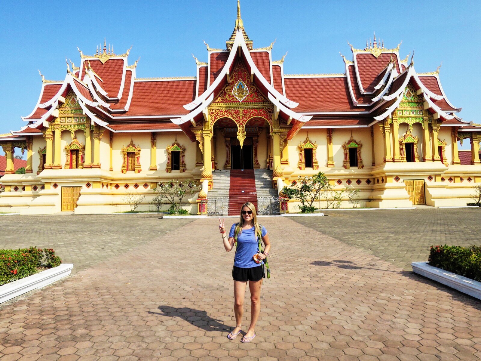 We rented bikes & rode to Pha That Luang, a Buddhist stupa in the capital of Laos. 