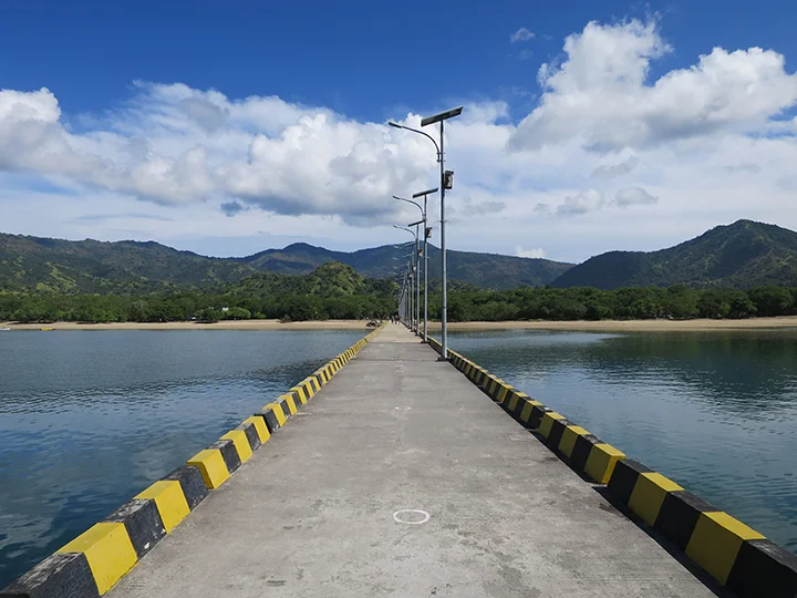 Crossing the long dock leading to Komodo Island. As soon as you step foot on the island, a guide is there to meet you. Guest safety is paramount.