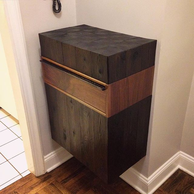 Introducing the third piece in the JAW Woodshop #firesidecollection installed in its new Manhattan home! This custom entry way piece is a wall-mounted walnut drawer box sandwiched between scorched cedar. More pics to come... #jawwoodshop #customfurni