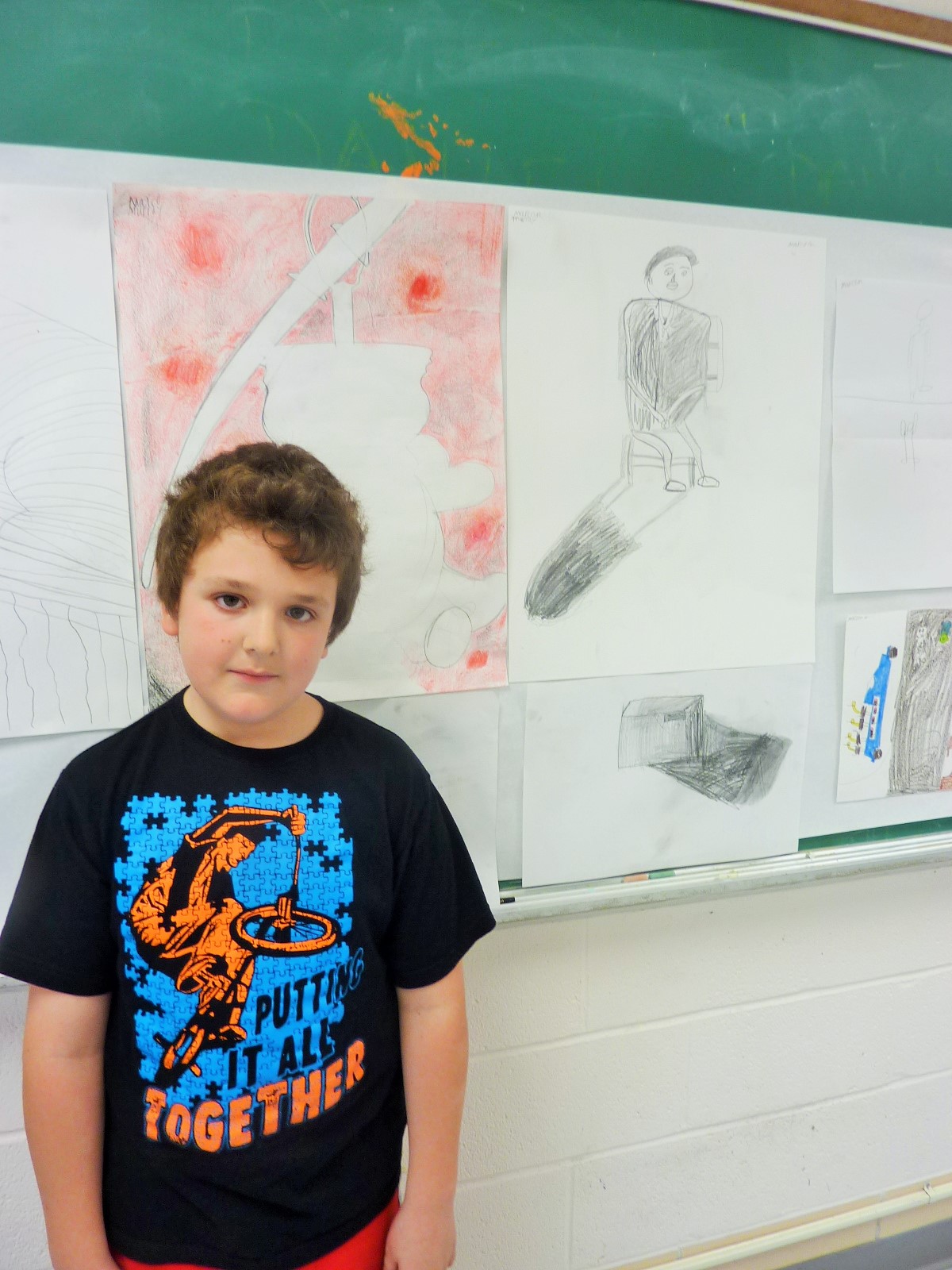 Marco was his best critic in the drawing class, his facial expression says it all!