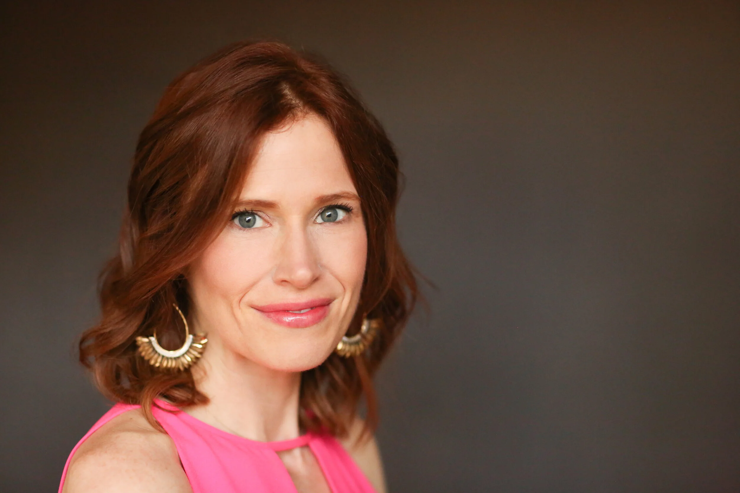 SantaCruzRedheadHeadshot.jpg