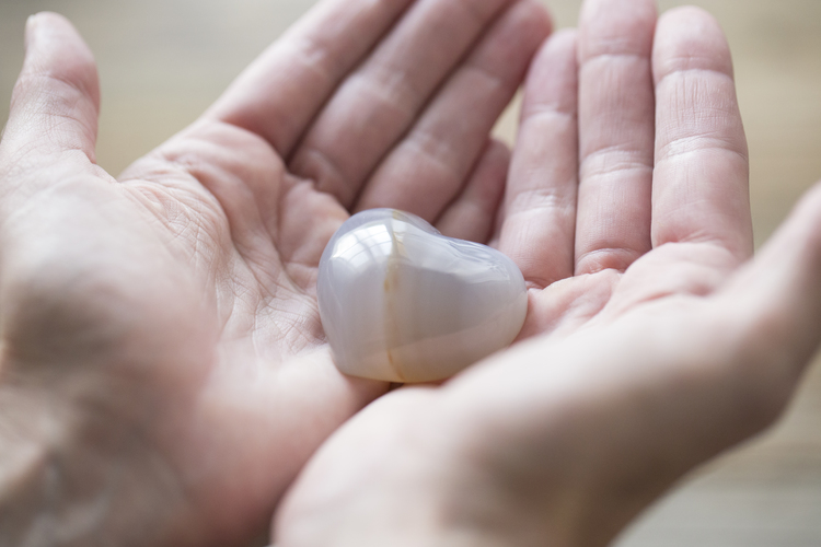 Julie Cimpko - The heart can be very powerful. This is a heart stone that Michelle gave me after visiting the Chopra Center. It is made of Agate and brings soothing, relaxing energy. It can calm emotions and protects.