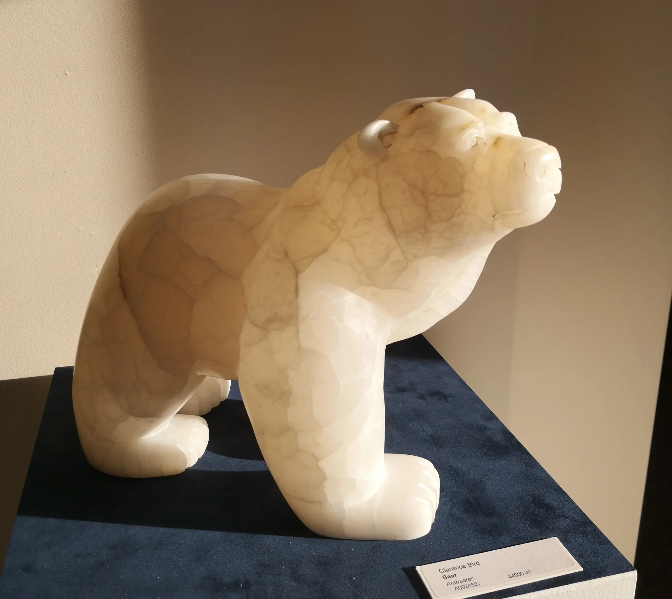 Clarence Keith Bird, “Mature Bear”, alabaster in sunlight, $3,000.00
