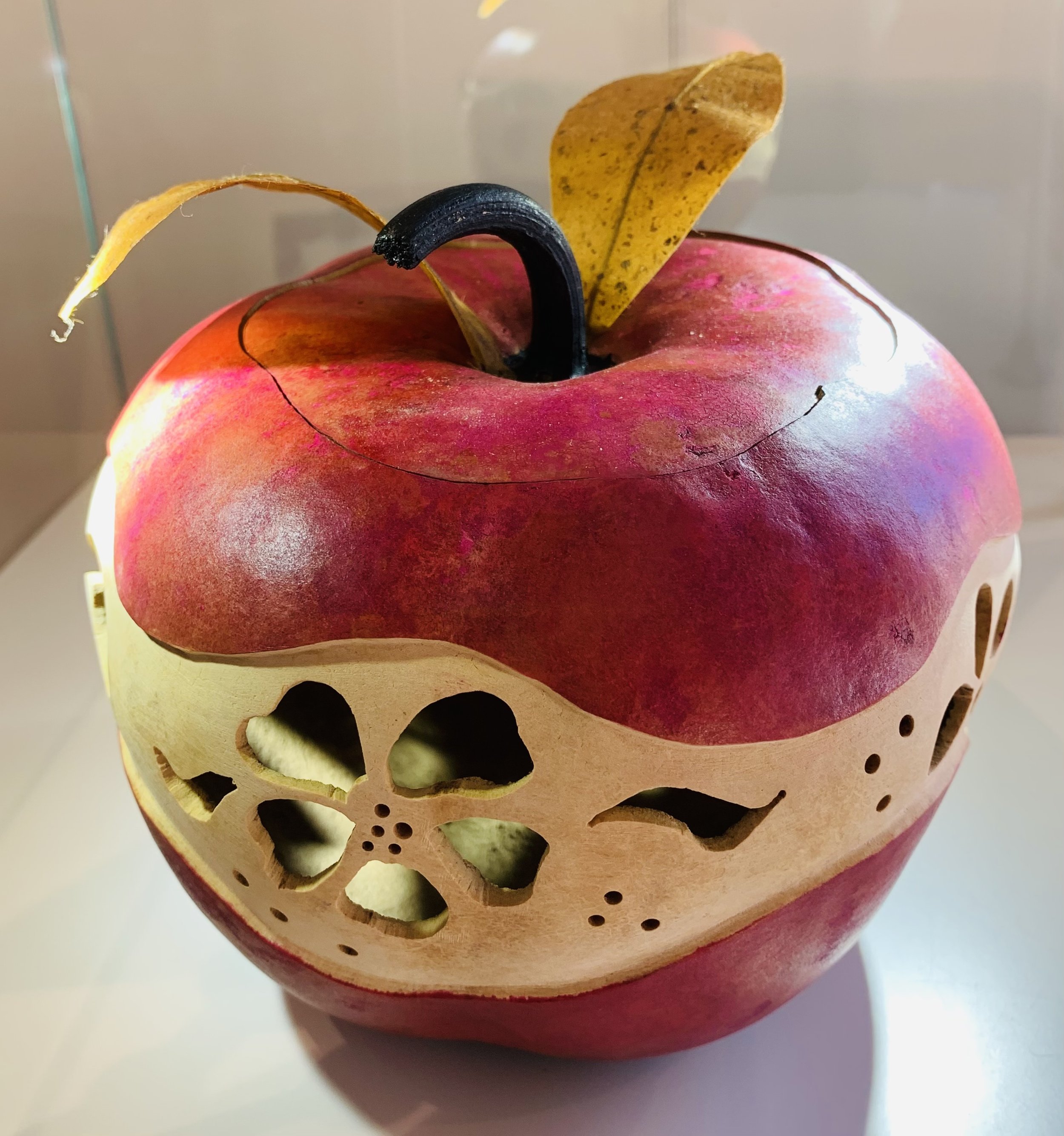  Sharon Medhurst, “Gourd Container with Lid”, carved and hand painted, 6.5”x7.5”, $85⁠ 