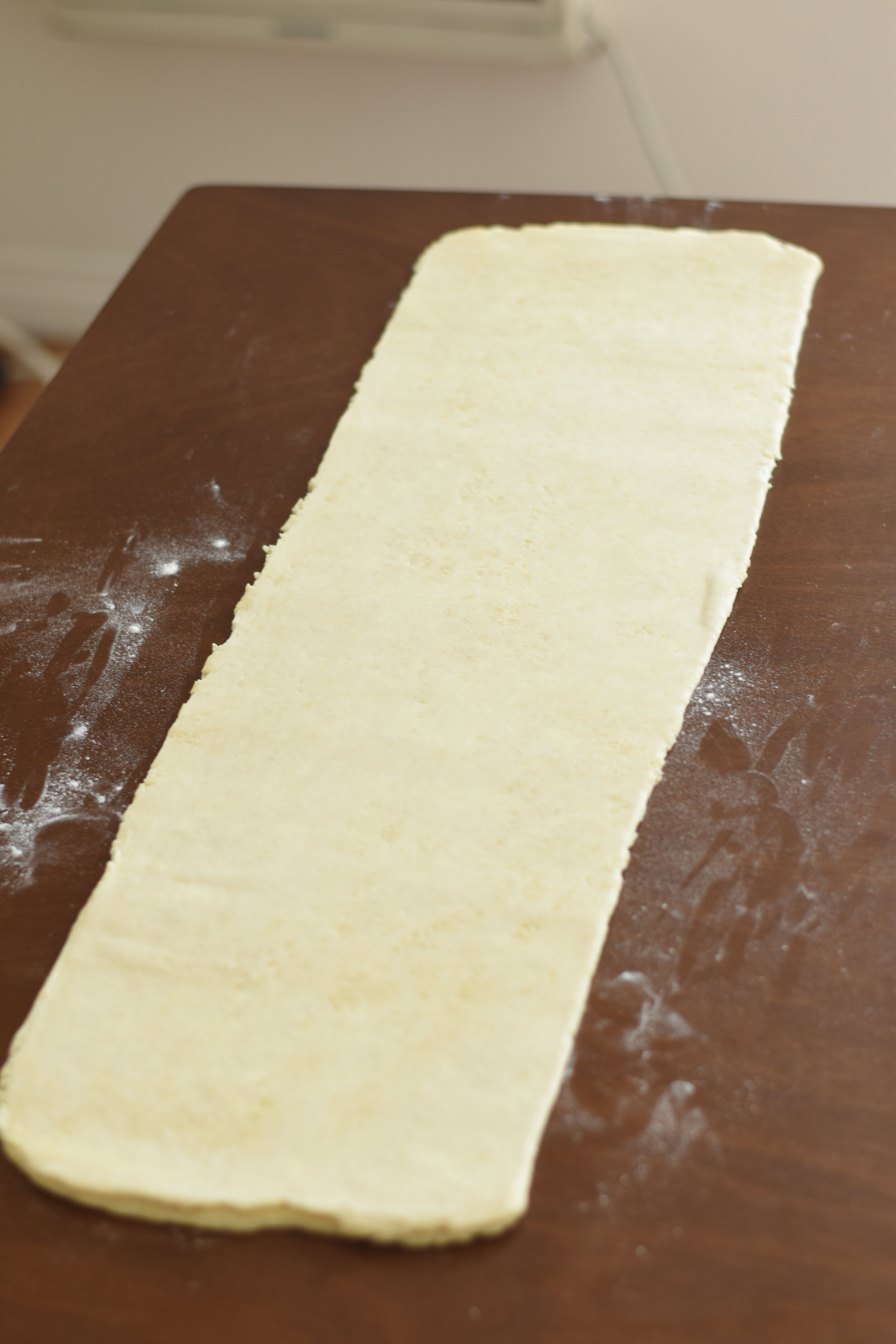  roll the dough package out to 4x its length 