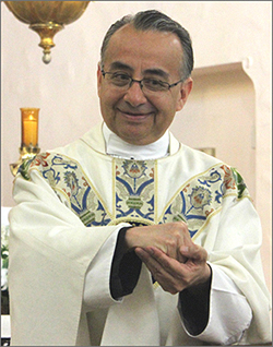 Father Martinez during First Communion Mass (April 23, 2016). Photo © 2016 Maia Rothstein / sacredheartnogales.org. All rights reserved. This photo may not be re-posted, distributed or altered in any way