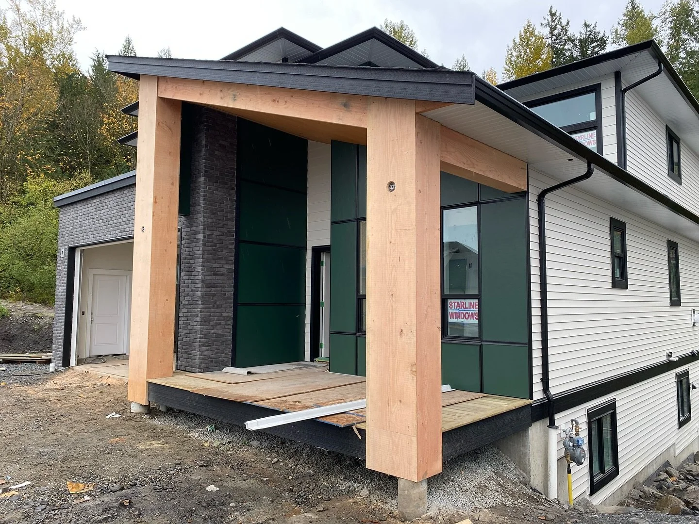 Here the real star of the show was the oversized posts and beams made out of 2 inch thick rough cut fir. This material was locally sourced and milled in Chilliwack. We’re lucky to live in a place that has such good quality renewable resources a