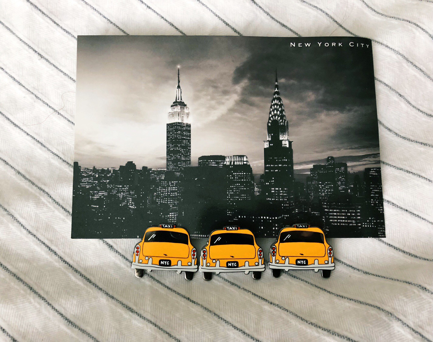 new! taxi cab lapel pins in the shop